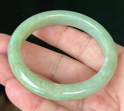 Rounded classic profile of 55.5mm icy apple green Burmese jade bangle JB558