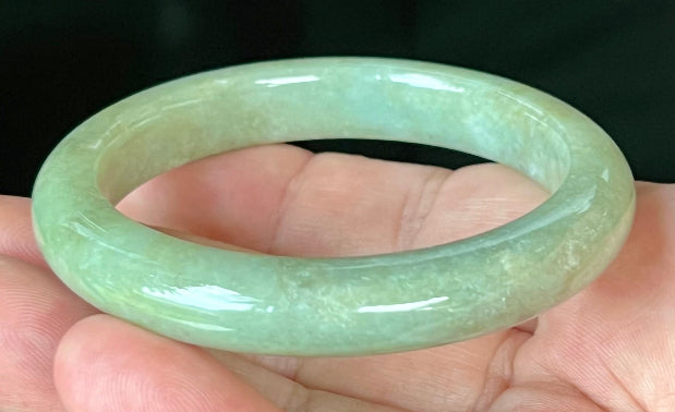 Rounded classic profile of 55.5mm icy apple green Burmese jade bangle JB558