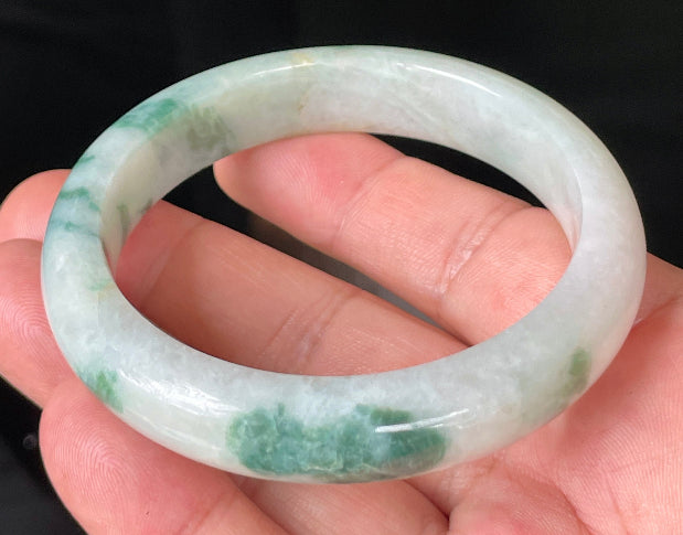 Flat inner and round outer edges of 58.5mm icy imperial green and honeycomb Burmese jade bangle JB214