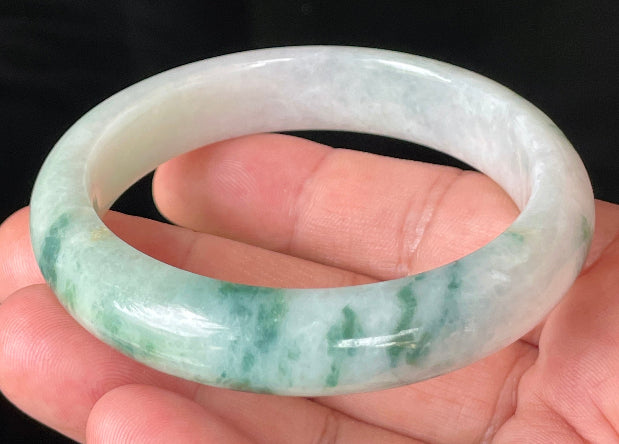 Flat inner and round outer edges of 58.5mm icy imperial green and honeycomb Burmese jade bangle JB214