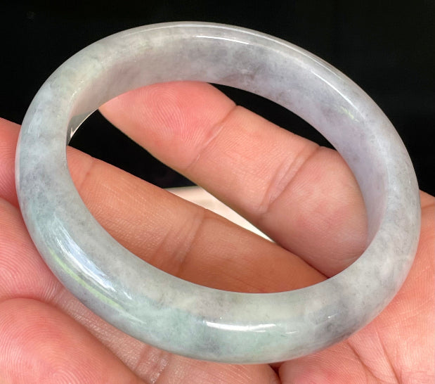 Rounded classic profile of 57mm icy grey, milky white and honey Burmese jade bangle JB358