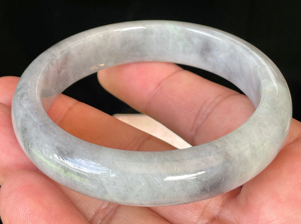 Rounded classic profile of 57mm icy grey, milky white and honey Burmese jade bangle JB358