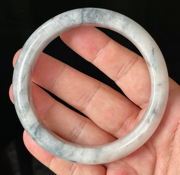Flat inner and round outer edges of 66.5mm icy grey, milky white, and honey Burmese jade bangle JB879