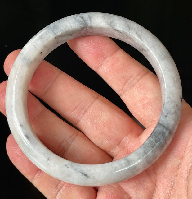 Flat inner and round outer edges of 66.5mm icy grey, milky white, and honey Burmese jade bangle JB879