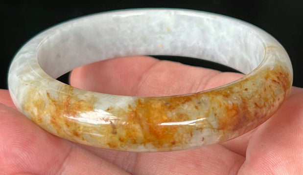 Rounded classic profile of 58.4mm icy greyish white and honey Burmese jade bangle JB531