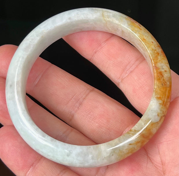 Rounded classic profile of 58.4mm icy greyish white and honey Burmese jade bangle JB531