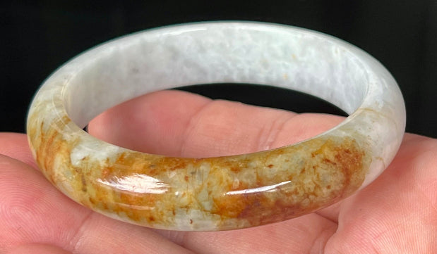 Rounded classic profile of 58.4mm icy greyish white and honey Burmese jade bangle JB531