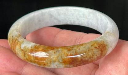 Rounded classic profile of 58.4mm icy greyish white and honey Burmese jade bangle JB531