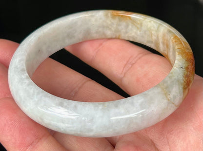 Rounded classic profile of 58.4mm icy greyish white and honey Burmese jade bangle JB531