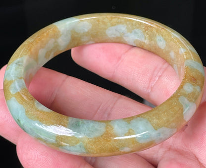 Rounded classic profile of 58.6mm icy honey, brown, bluish and milky white Burmese jade bangle JB094