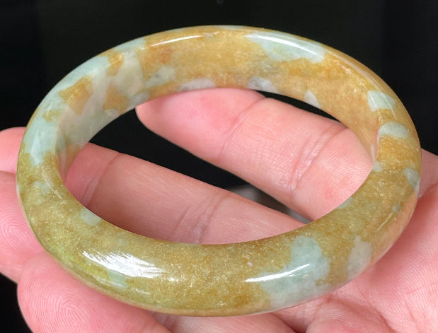 Rounded classic profile of 58.6mm icy honey, brown, bluish and milky white Burmese jade bangle JB094