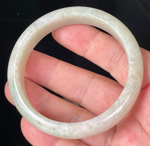 Rounded classic profile of 59.8mm icy honey, milky white and imperial green Burmese jade bangle JB352