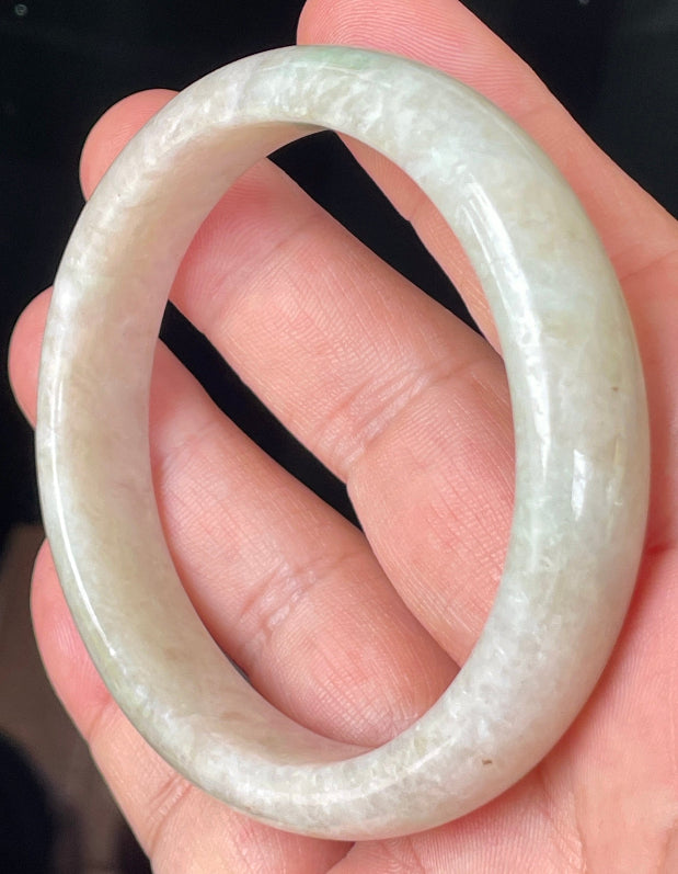 Rounded classic profile of 59.8mm icy honey, milky white and imperial green Burmese jade bangle JB352