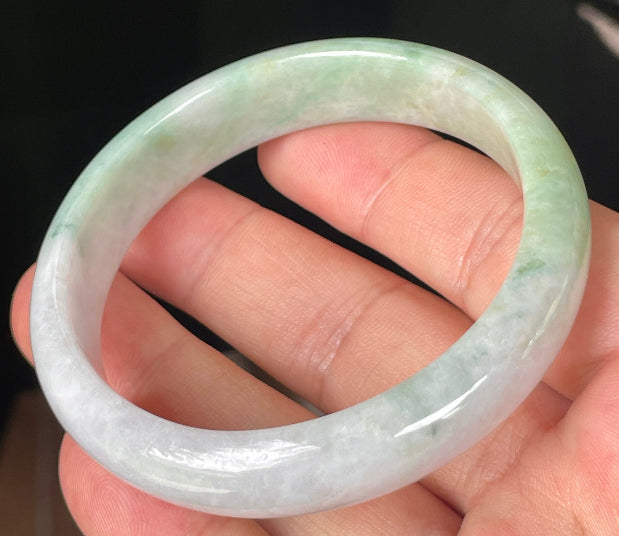 Rounded classic profile of 57mm icy lavender, milky white and green Burmese jade bangle JB356