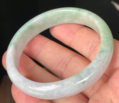 Rounded classic profile of 57mm icy lavender, milky white and green Burmese jade bangle JB356