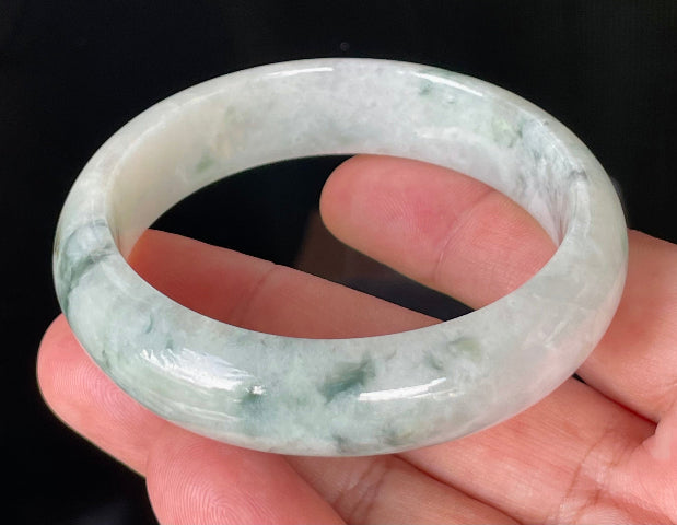 Flat inner and round outer edges of 58.4mm greyish white, apple green, and imperial green Burmese jade bangle JB831
