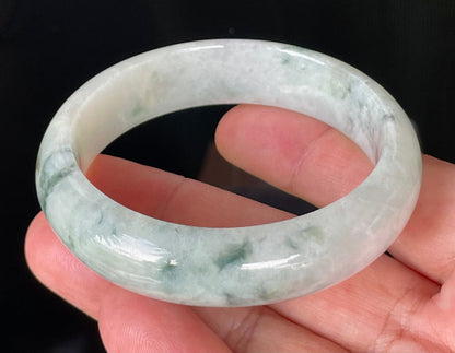 Flat inner and round outer edges of 58.4mm greyish white, apple green, and imperial green Burmese jade bangle JB831