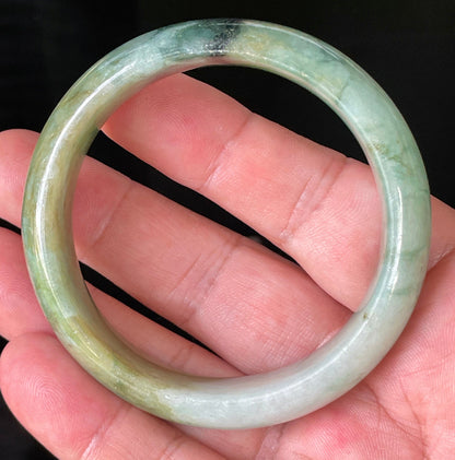 Rounded classic profile of 55mm icy bluish apple green, honey and milky white Burmese jade bangle JB233