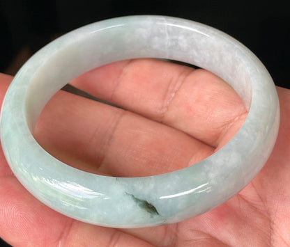 Rounded classic profile of 58.8mm icy greyish white, light apple green and bluish Burmese jade bangle JB231