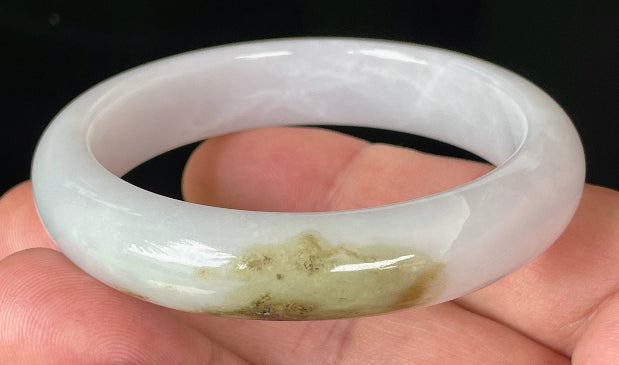 Rounded classic profile of 53.4mm icy white, green and honey Burmese jade bangle JB354