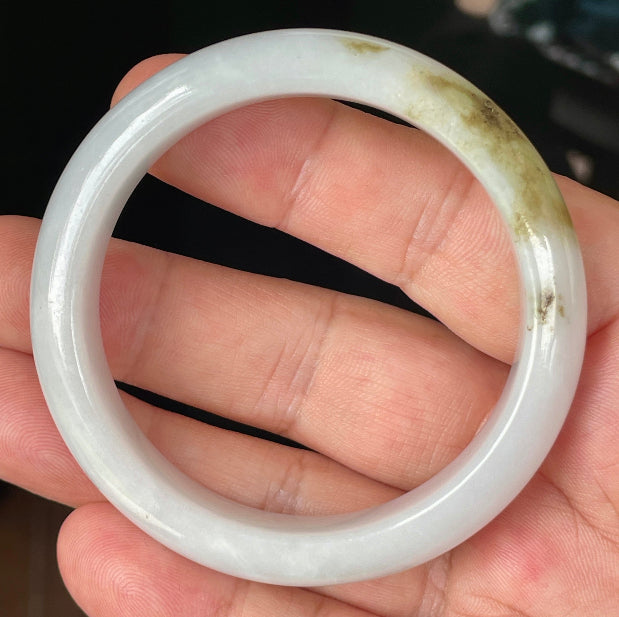 Rounded classic profile of 53.4mm icy white, green and honey Burmese jade bangle JB354