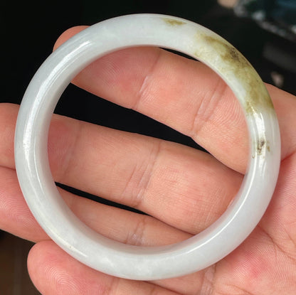 Rounded classic profile of 53.4mm icy white, green and honey Burmese jade bangle JB354