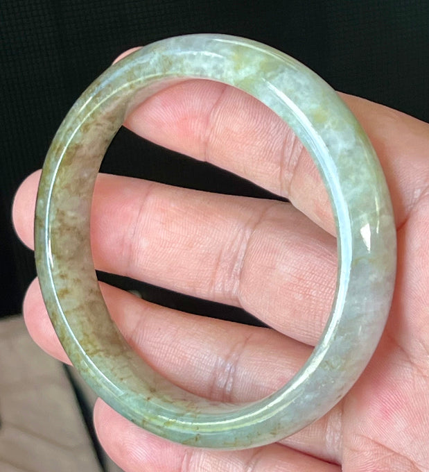 Rounded classic profile of 58.8mm icy grayish white, green and honey Burmese jade bangle JB512