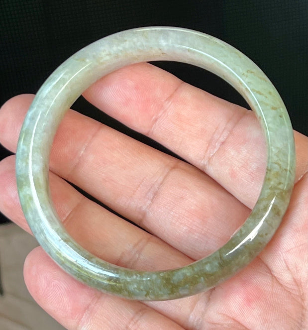 Rounded classic profile of 58.8mm icy grayish white, green and honey Burmese jade bangle JB512