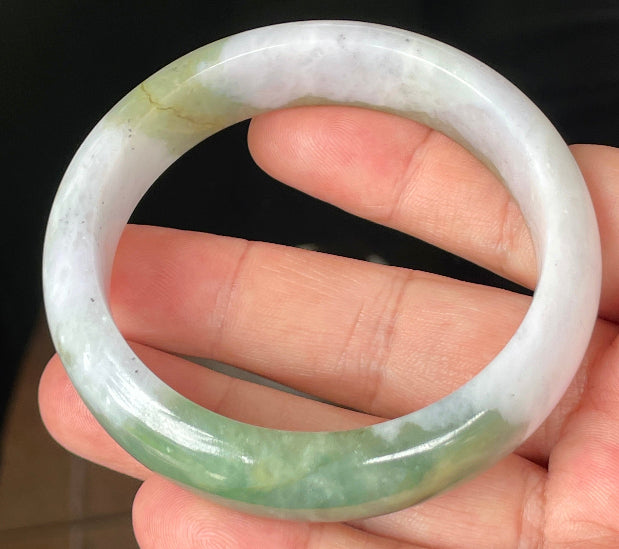 Rounded classic profile of 58.6mm icy greyish white, apple and forest green Burmese jade bangle JB095