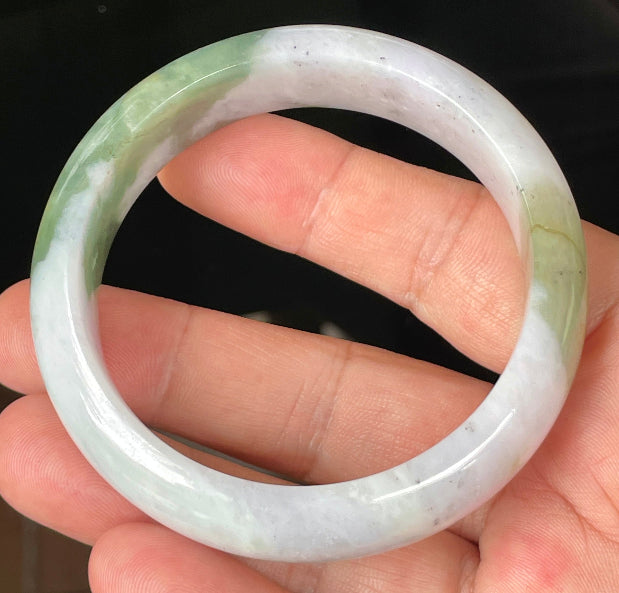 Rounded classic profile of 58.6mm icy greyish white, apple and forest green Burmese jade bangle JB095