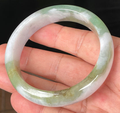 Rounded classic profile of 58.6mm icy greyish white, apple and forest green Burmese jade bangle JB095