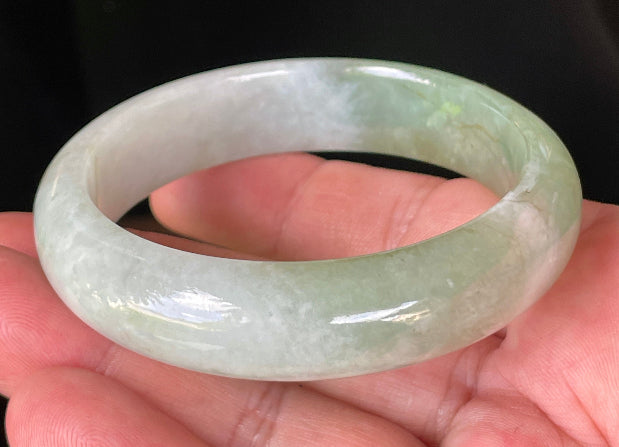 Rounded classic profile of 56.6mm icy milky white and apple green Burmese jade bangle JB151