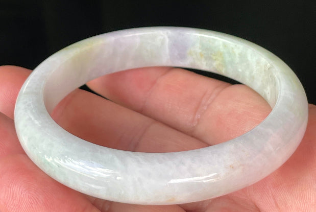 Rounded classic profile of 58.9mm icy milky white and apple green Burmese jade bangle JB235