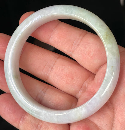 Rounded classic profile of 58.9mm icy milky white and apple green Burmese jade bangle JB235