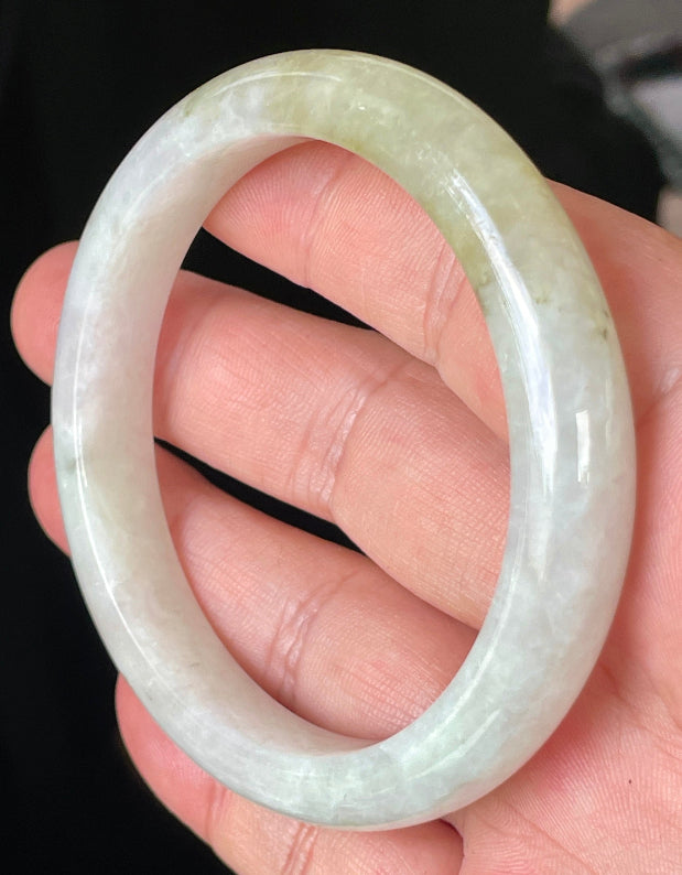 Rounded classic profile of 58.8mm icy milky white and light apple green Burmese jade bangle JB237