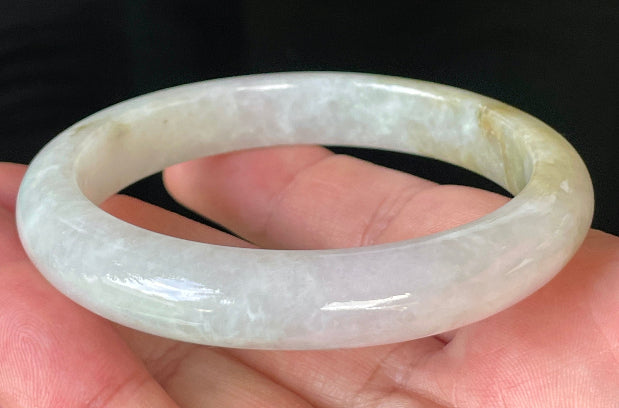 Rounded classic profile of 58.8mm icy milky white and light apple green Burmese jade bangle JB237