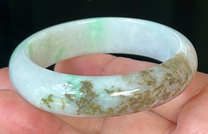 Rounded classic profile of 56.7mm icy white and green Burmese jade bangle JB527