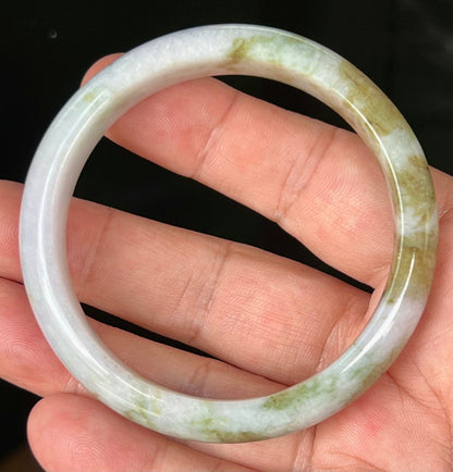 Rounded classic profile of 58.4mm icy white and moss green Burmese jade bangle JB535