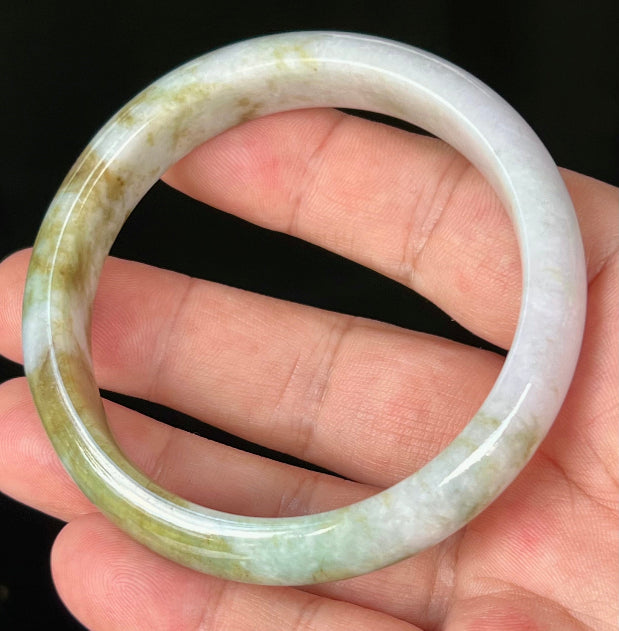 Rounded classic profile of 58.4mm icy white and moss green Burmese jade bangle JB535