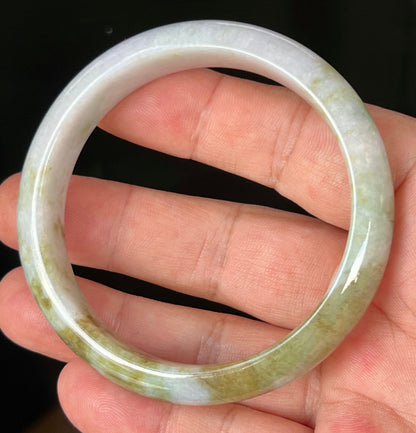 Rounded classic profile of 58.4mm icy white and moss green Burmese jade bangle JB535