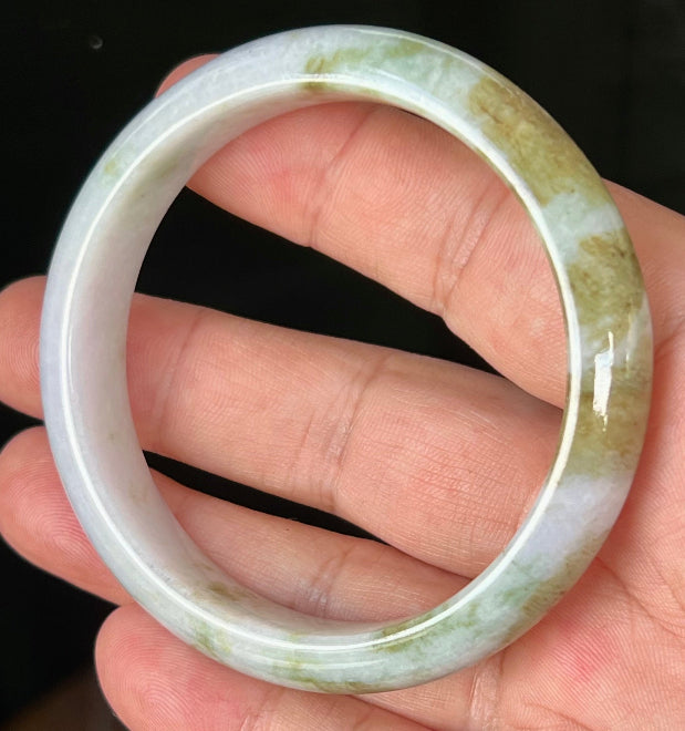 Rounded classic profile of 58.4mm icy white and moss green Burmese jade bangle JB535