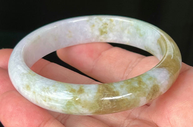 Rounded classic profile of 58.4mm icy white and moss green Burmese jade bangle JB535
