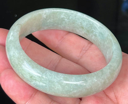 Rounded classic profile of 58.2mm icy light green and milky white Burmese jade bangle JB536