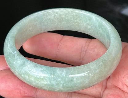Rounded classic profile of 58.2mm icy light green and milky white Burmese jade bangle JB536