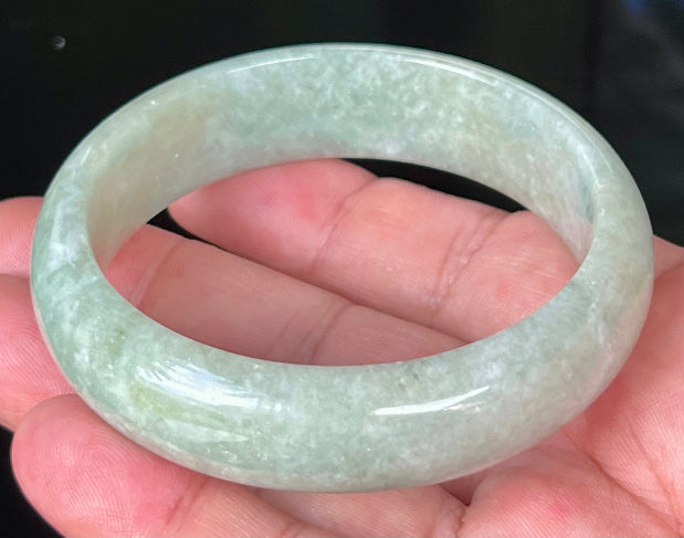 Rounded classic profile of 58.2mm icy light green and milky white Burmese jade bangle JB536