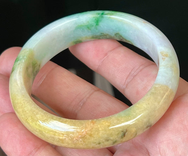 Rounded classic profile of 58mm icy white and honey yellow Burmese jade bangle JB545