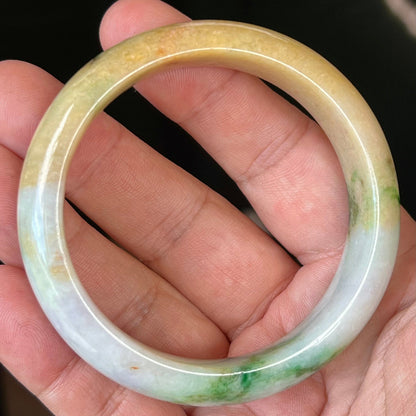 Rounded classic profile of 58mm icy white and honey yellow Burmese jade bangle JB545