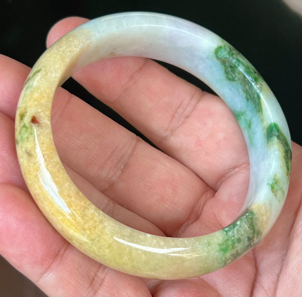 Rounded classic profile of 58mm icy white and honey yellow Burmese jade bangle JB545