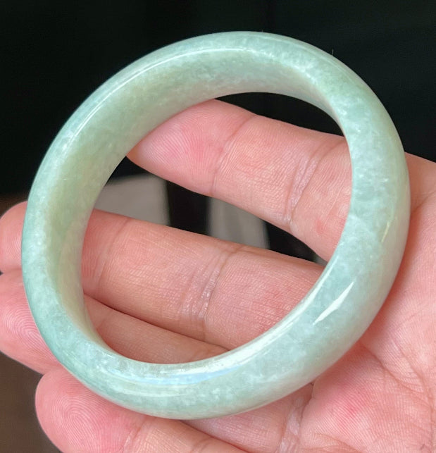Rounded classic profile of 58.3mm icy green and white Burmese jade bangle JB548