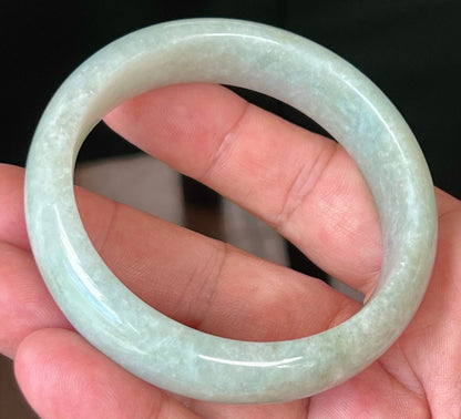 Rounded classic profile of 58.3mm icy green and white Burmese jade bangle JB548